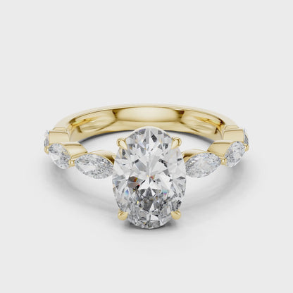 Flora 2 Carat Oval Lab Grown Diamond Graduated Engagement Ring - Yellow Gold video