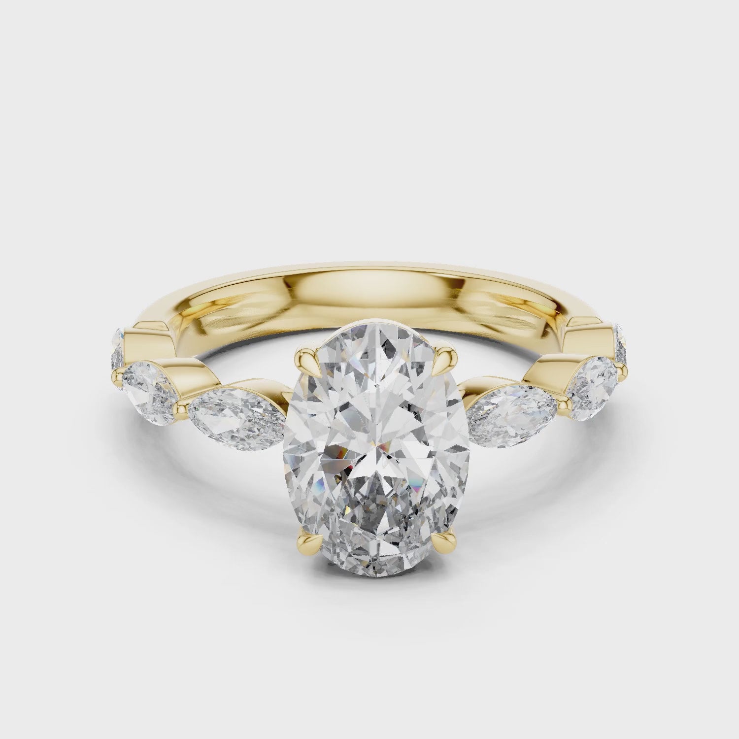 Flora 2 Carat Oval Lab Grown Diamond Graduated Engagement Ring - Yellow Gold video