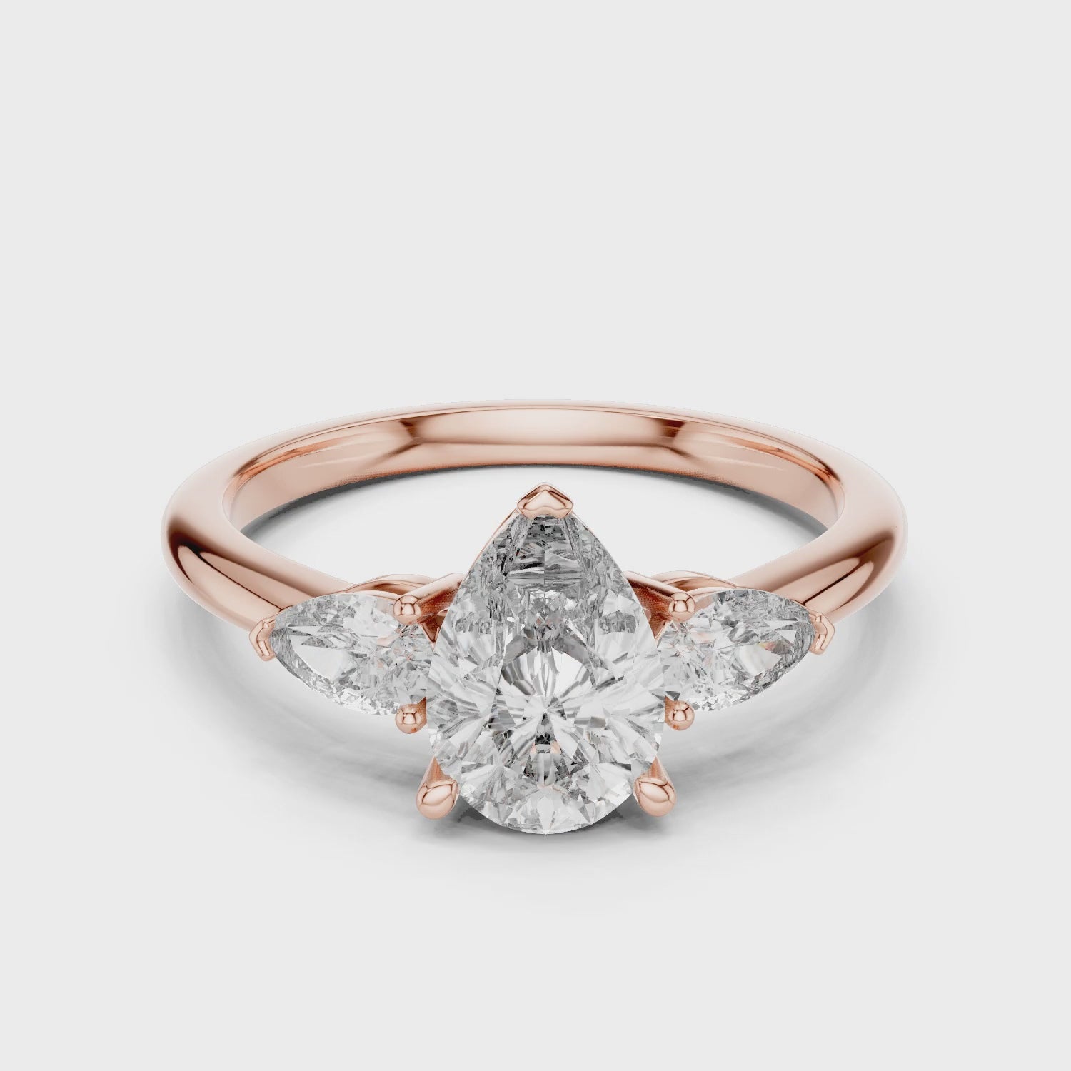 Sienna 1 Carat Pear Lab Grown Diamond Graduated Three Stone Ring - Rose Gold video