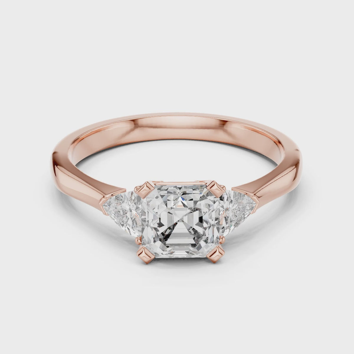 Vera 2 Carat Emerald Lab Grown Diamond Trillion Accent Three Stone Ring - Rose Gold video