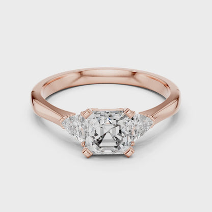Vera 2 Carat Emerald Lab Grown Diamond Trillion Accent Three Stone Ring - Rose Gold video