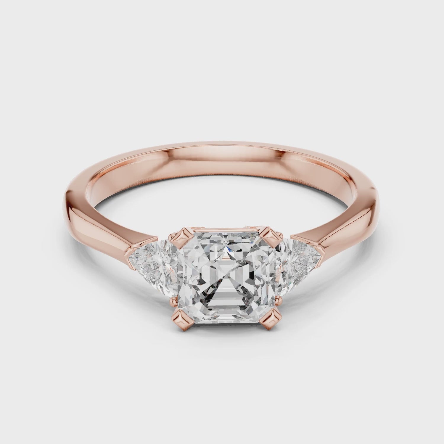 Vera 2 Carat Emerald Lab Grown Diamond Trillion Accent Three Stone Ring - Rose Gold video