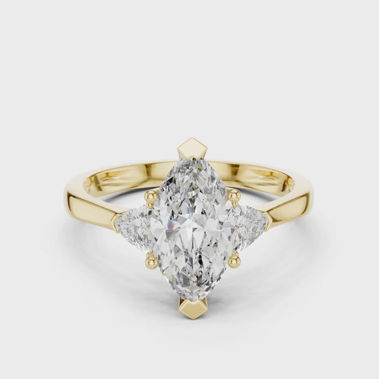 Sienna 1 Carat Marquise Lab Grown Diamond Collet Three Stone Ring - Yellow Gold video