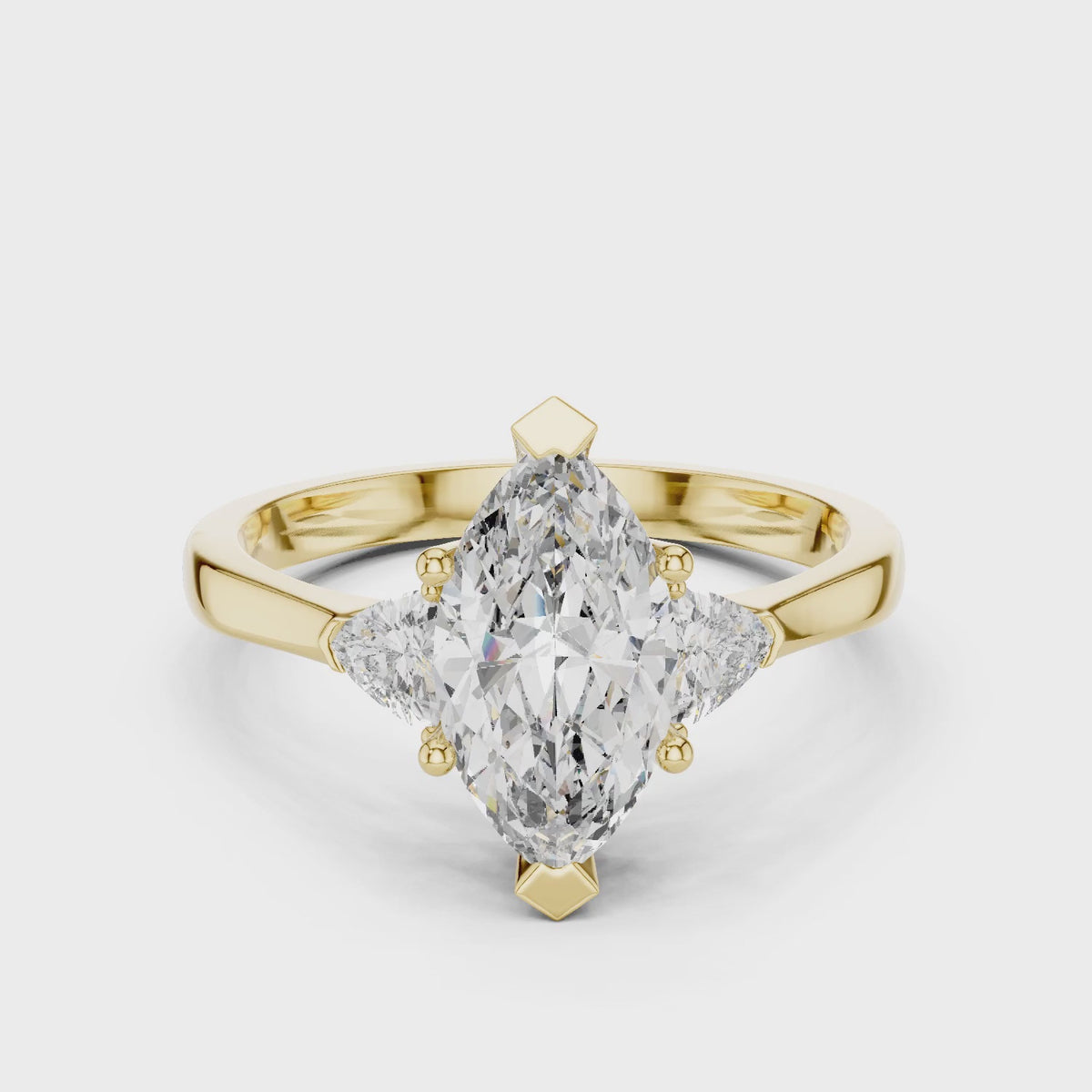 Sienna 1 Carat Marquise Lab Grown Diamond Collet Three Stone Ring - Yellow Gold video