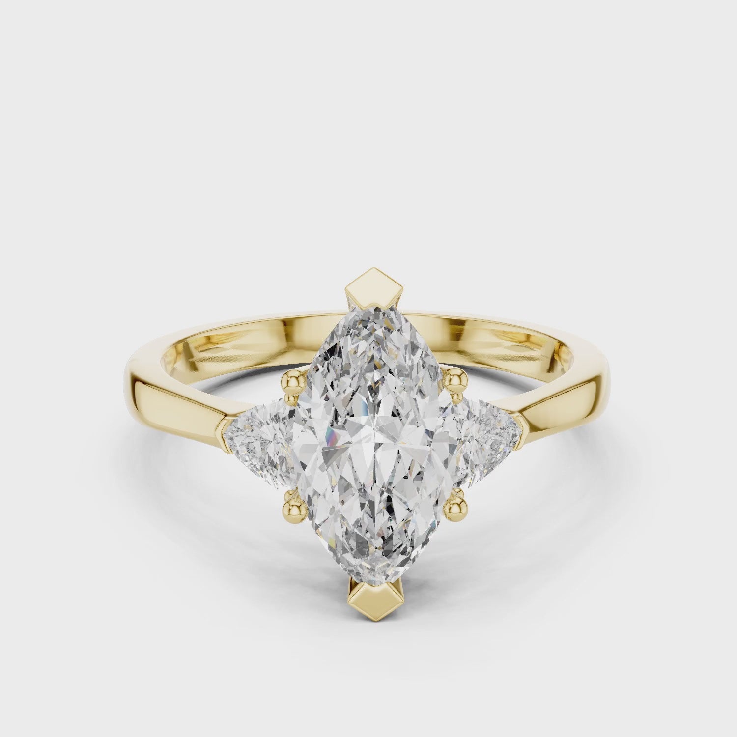 Sienna 1 Carat Marquise Lab Grown Diamond Collet Three Stone Ring - Yellow Gold video
