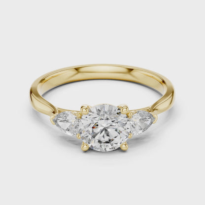 Sienna 1.5 Carat Round Lab Grown Diamond Three Stone Ring - Yellow Gold video