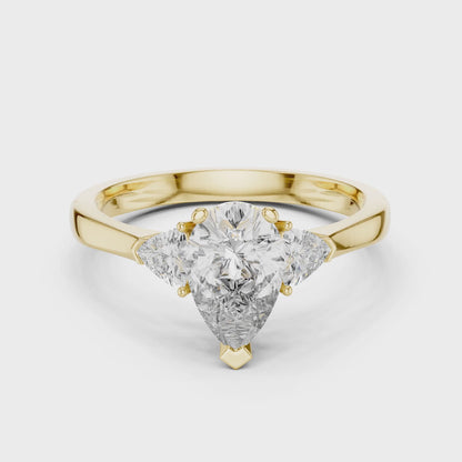 Sienna 1 Carat Pear Lab Grown Diamond Collet Three Stone Ring - Yellow Gold video