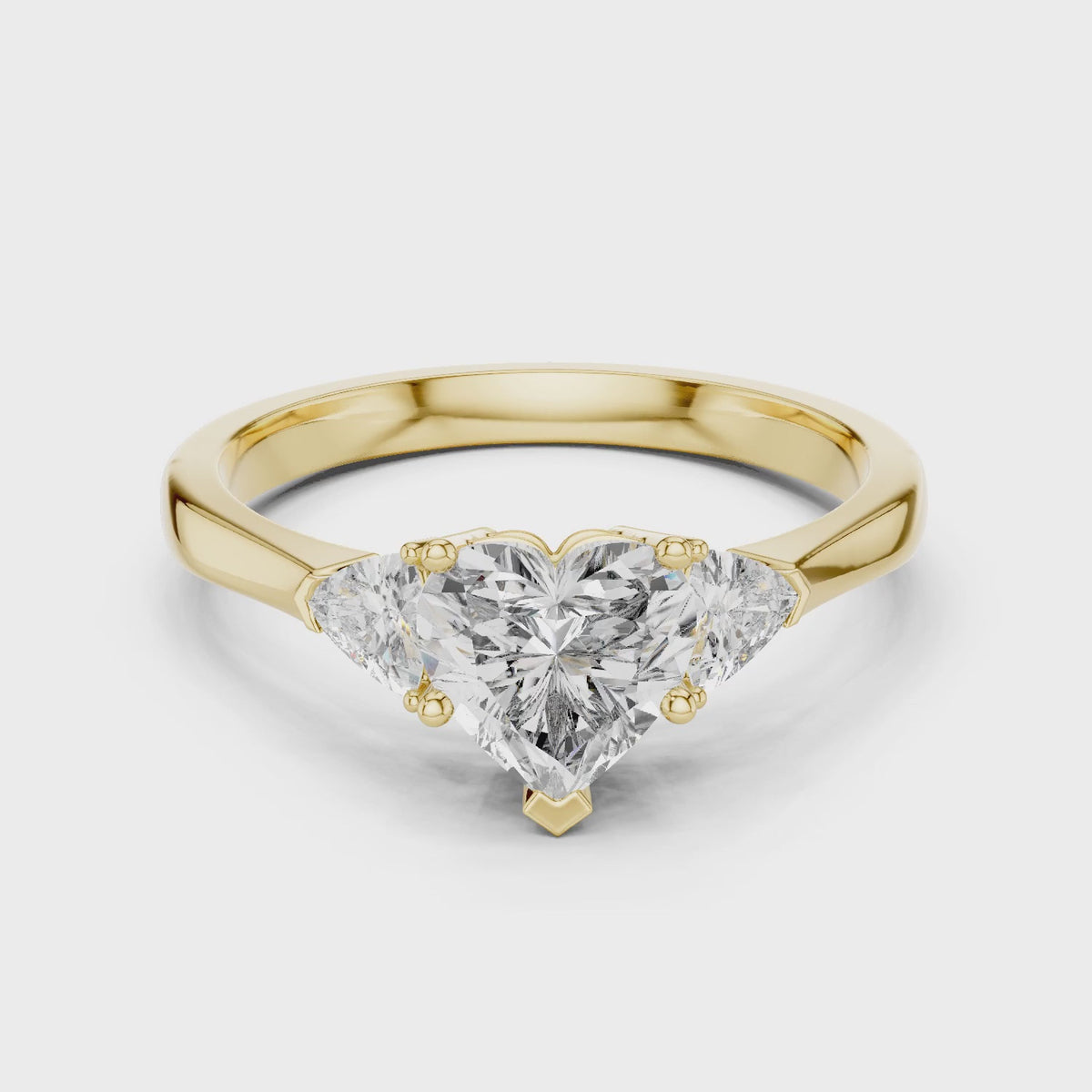 Amara 1 Carat Heart Lab Grown Diamond Collet Three Stone Ring - Yellow Gold video