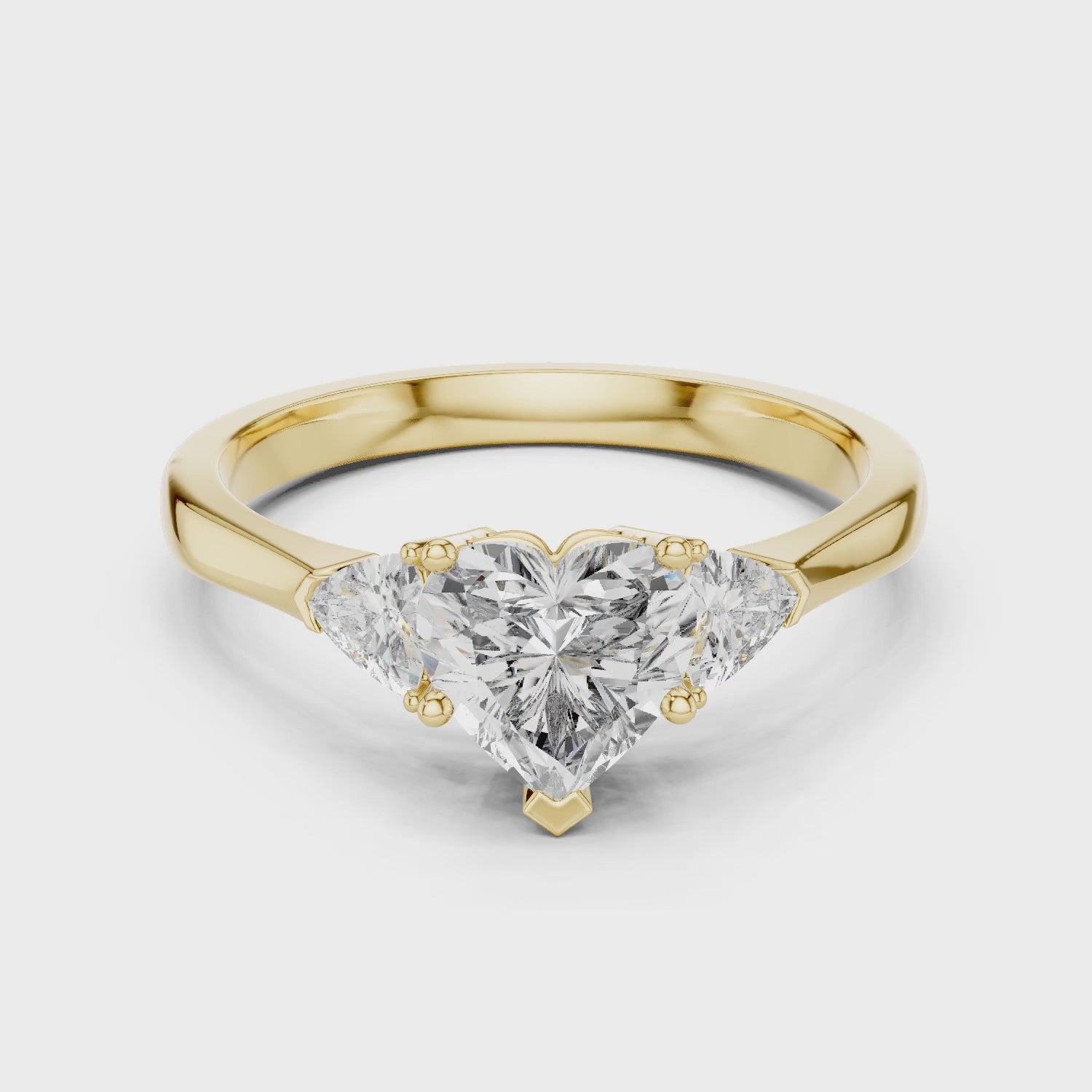 Amara 1 Carat Heart Lab Grown Diamond Collet Three Stone Ring - Yellow Gold video