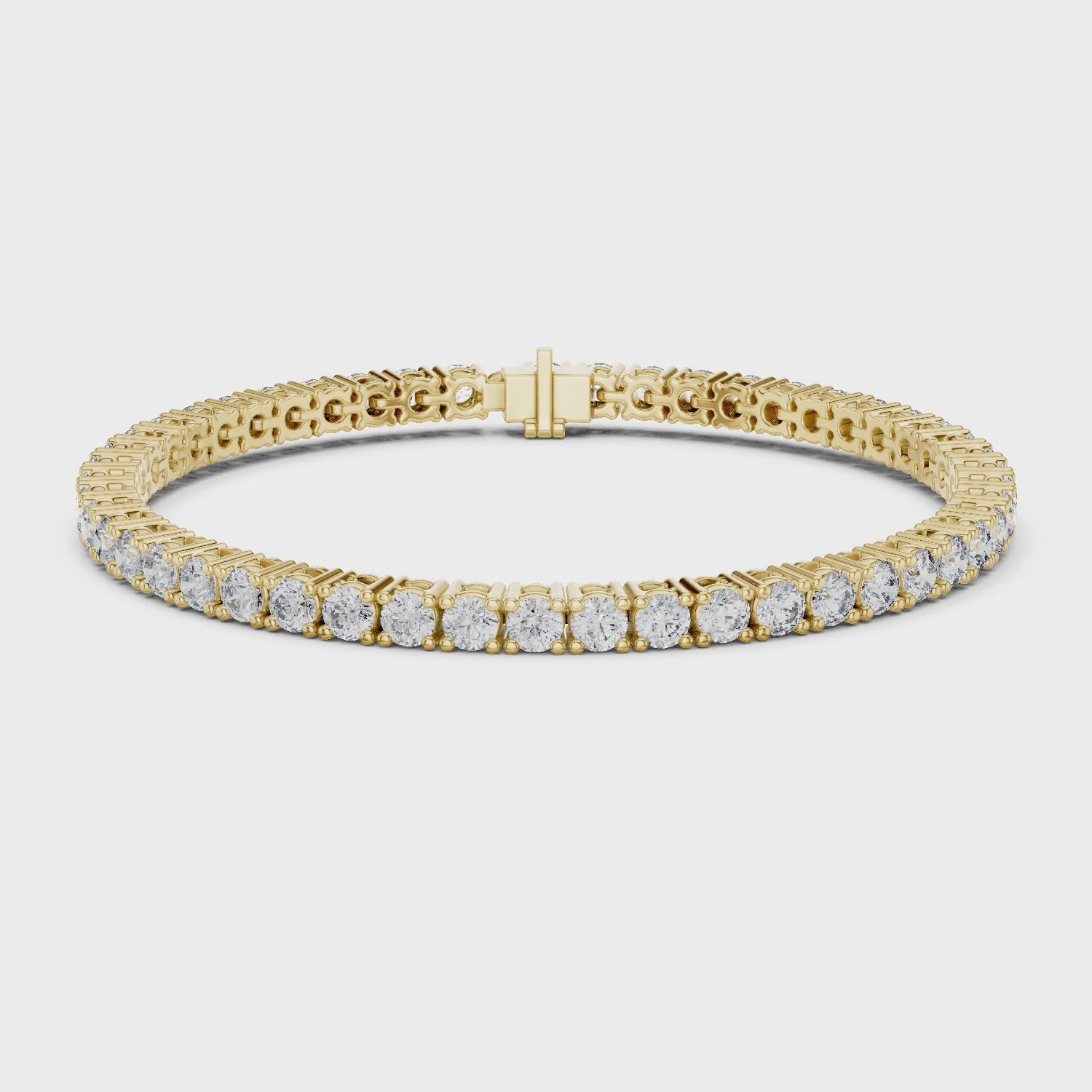 Aurora 7 Carat Round Lab Grown Diamond Collet Tennis Bracelet - Yellow Gold video