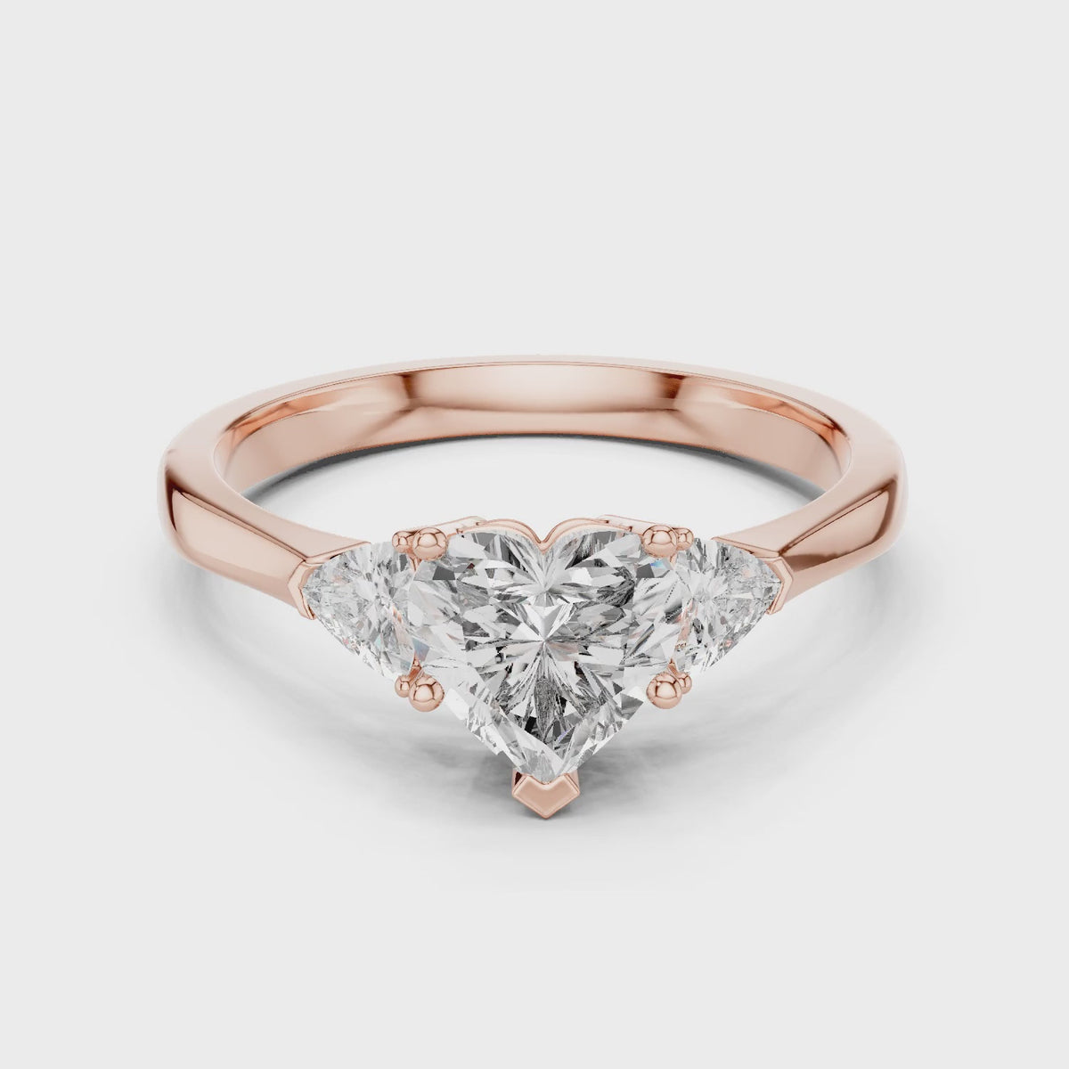 Amara 1 Carat Heart Lab Grown Diamond Collet Three Stone Ring - Rose Gold video