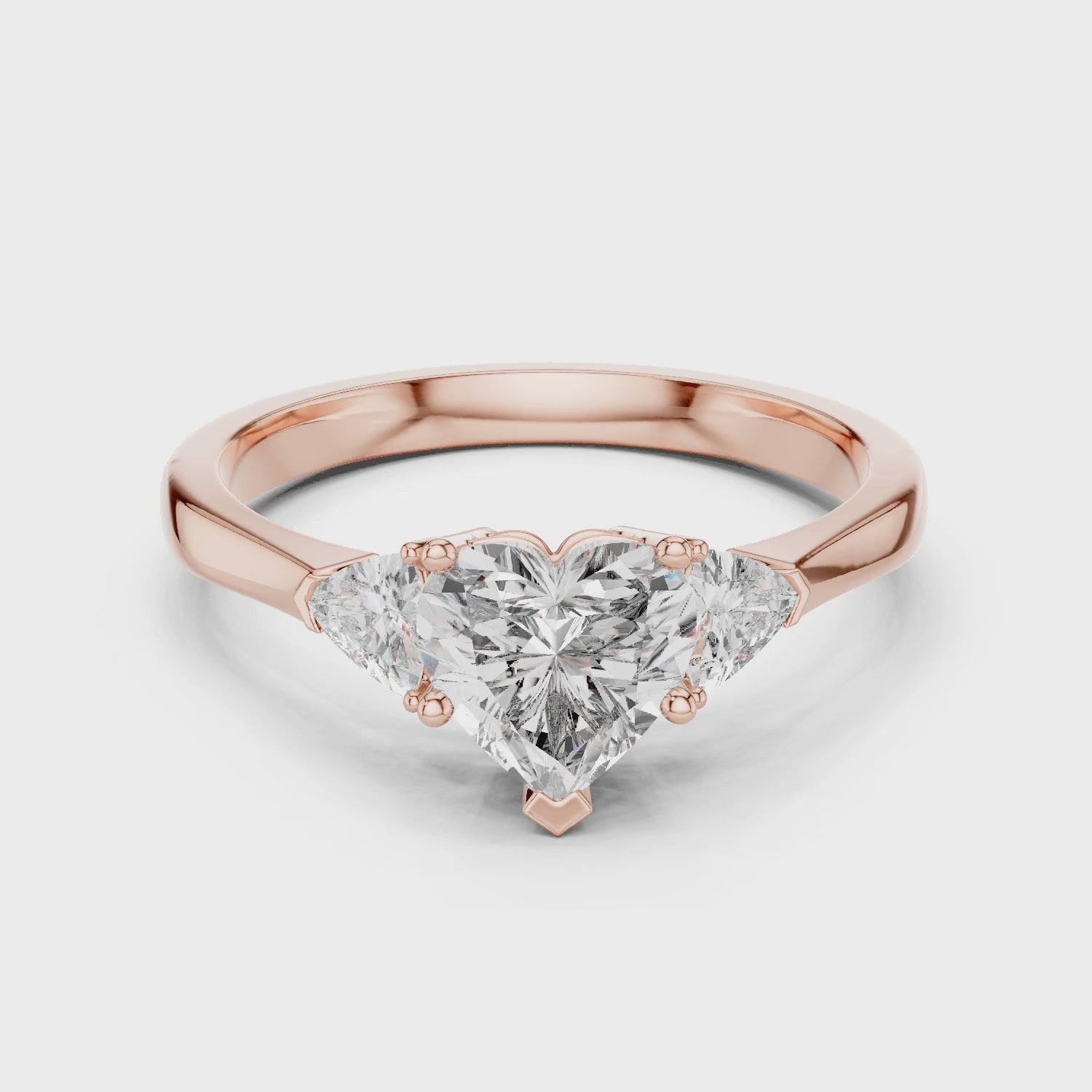 Amara 1 Carat Heart Lab Grown Diamond Collet Three Stone Ring - Rose Gold video