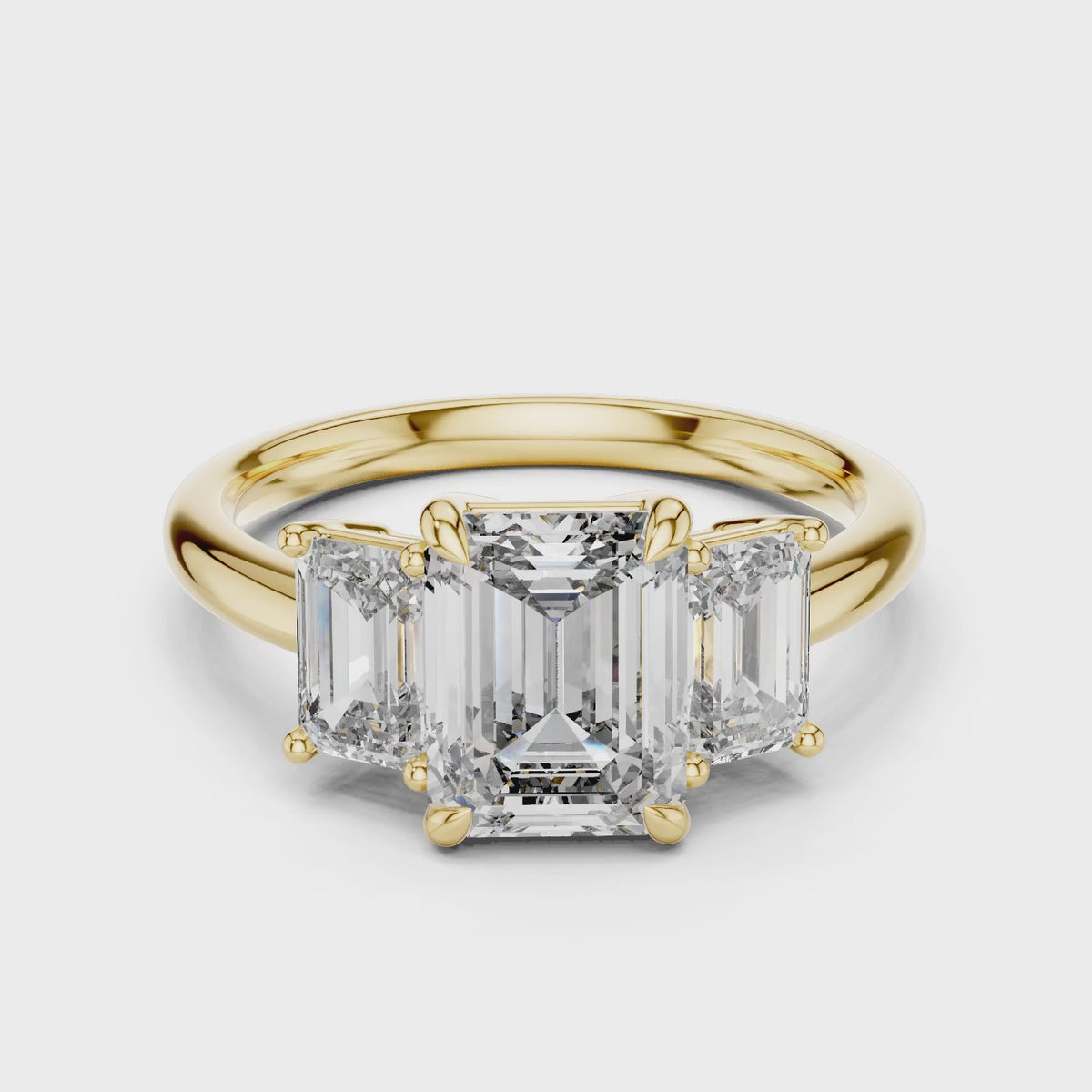 Vera 2 Carat Emerald Lab Grown Diamond Emerald Cut Three Stone Ring - Yellow Gold video