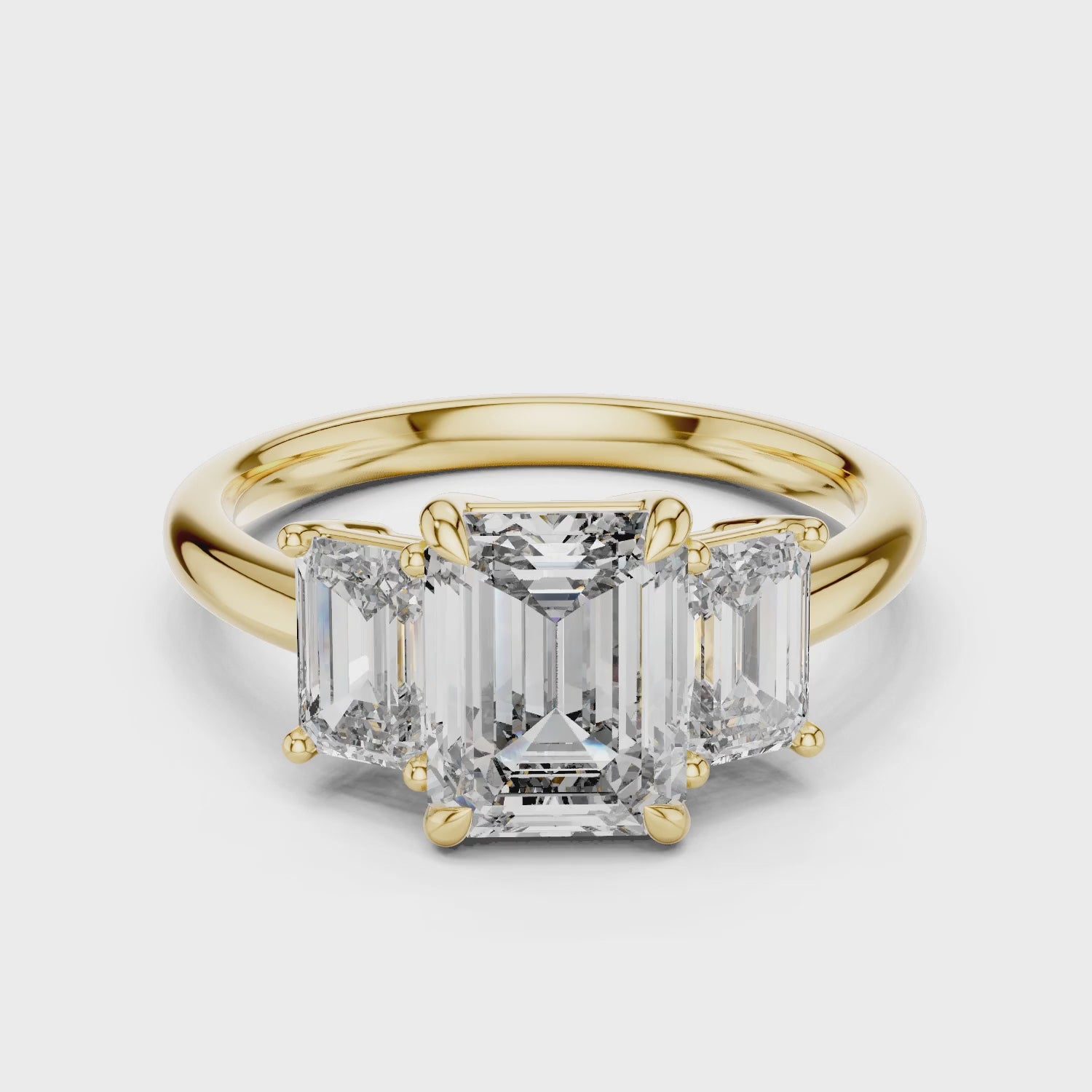 Vera 2 Carat Emerald Lab Grown Diamond Emerald Cut Three Stone Ring - Yellow Gold video