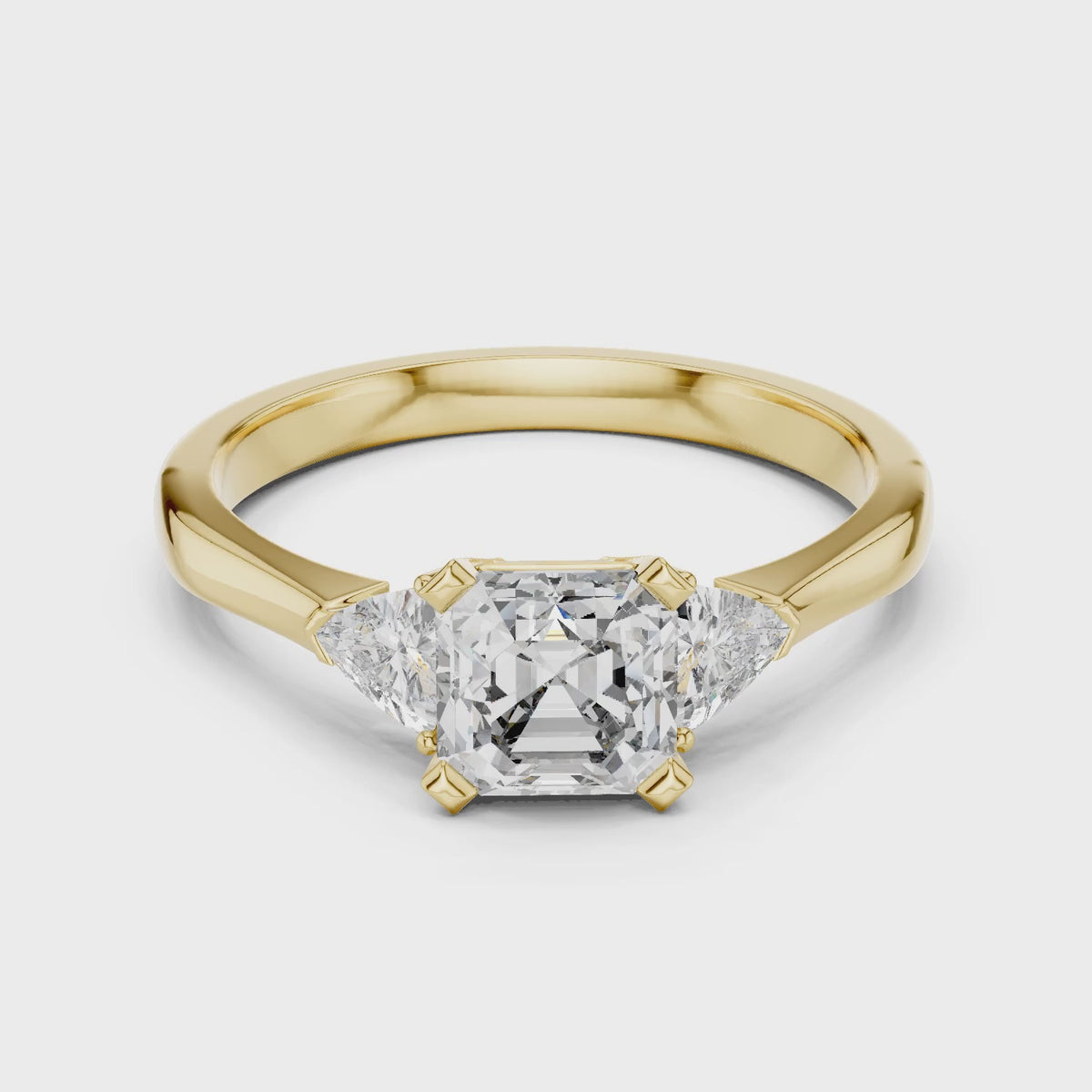 Vera 2 Carat Emerald Lab Grown Diamond Trillion Accent Three Stone Ring - Yellow Gold video