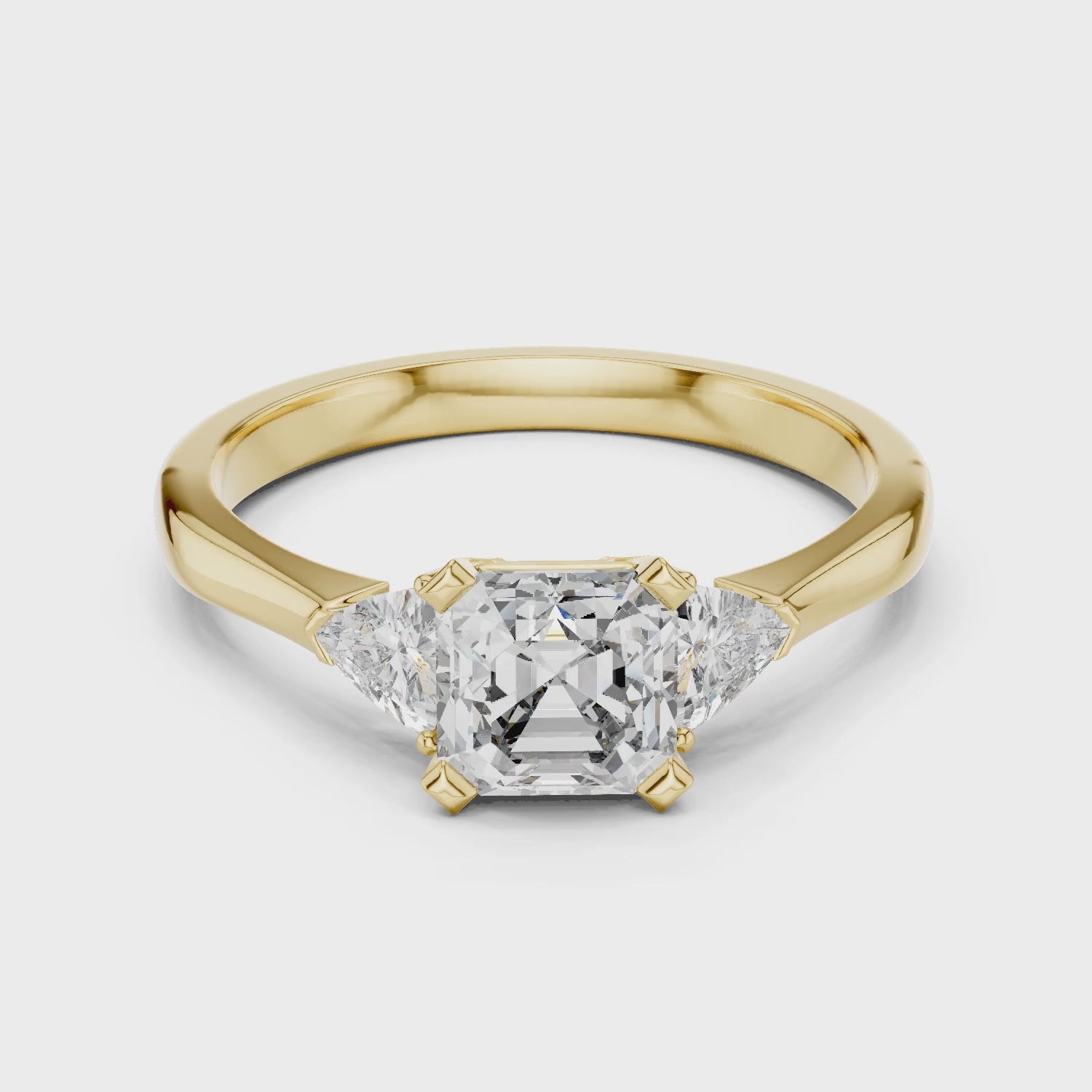 Vera 2 Carat Emerald Lab Grown Diamond Trillion Accent Three Stone Ring - Yellow Gold video